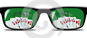 Cards are reflected in a poker playerÃ¢â¬â¢s EYEGLASSES photo